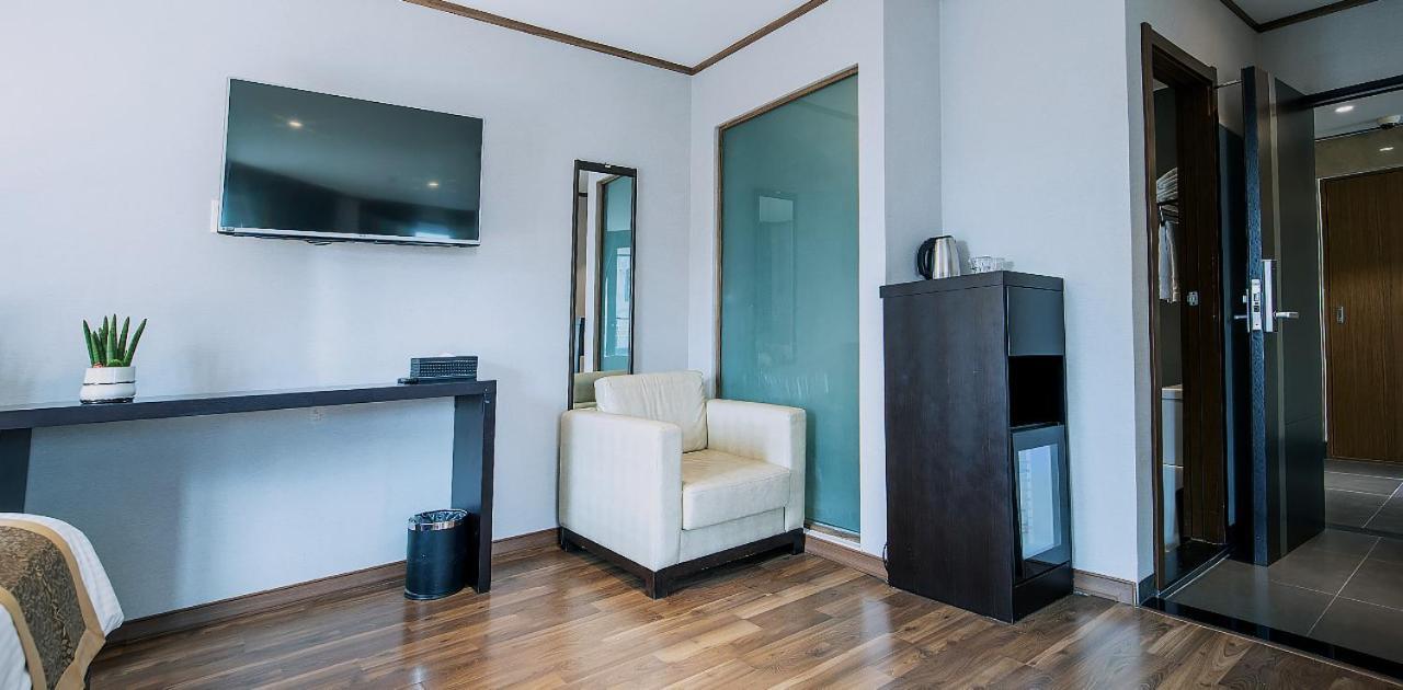 Sunland Hotel Чеджудо Экстерьер фото